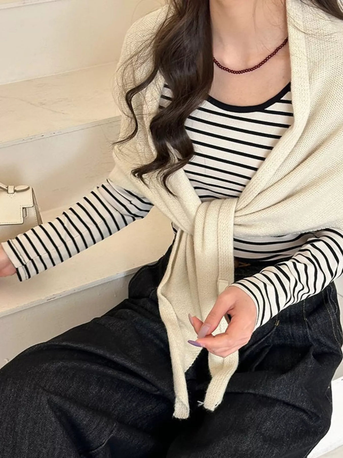 Women's Neutral Wool Shoulder Wrap — off-white wrap loosely tied at the front