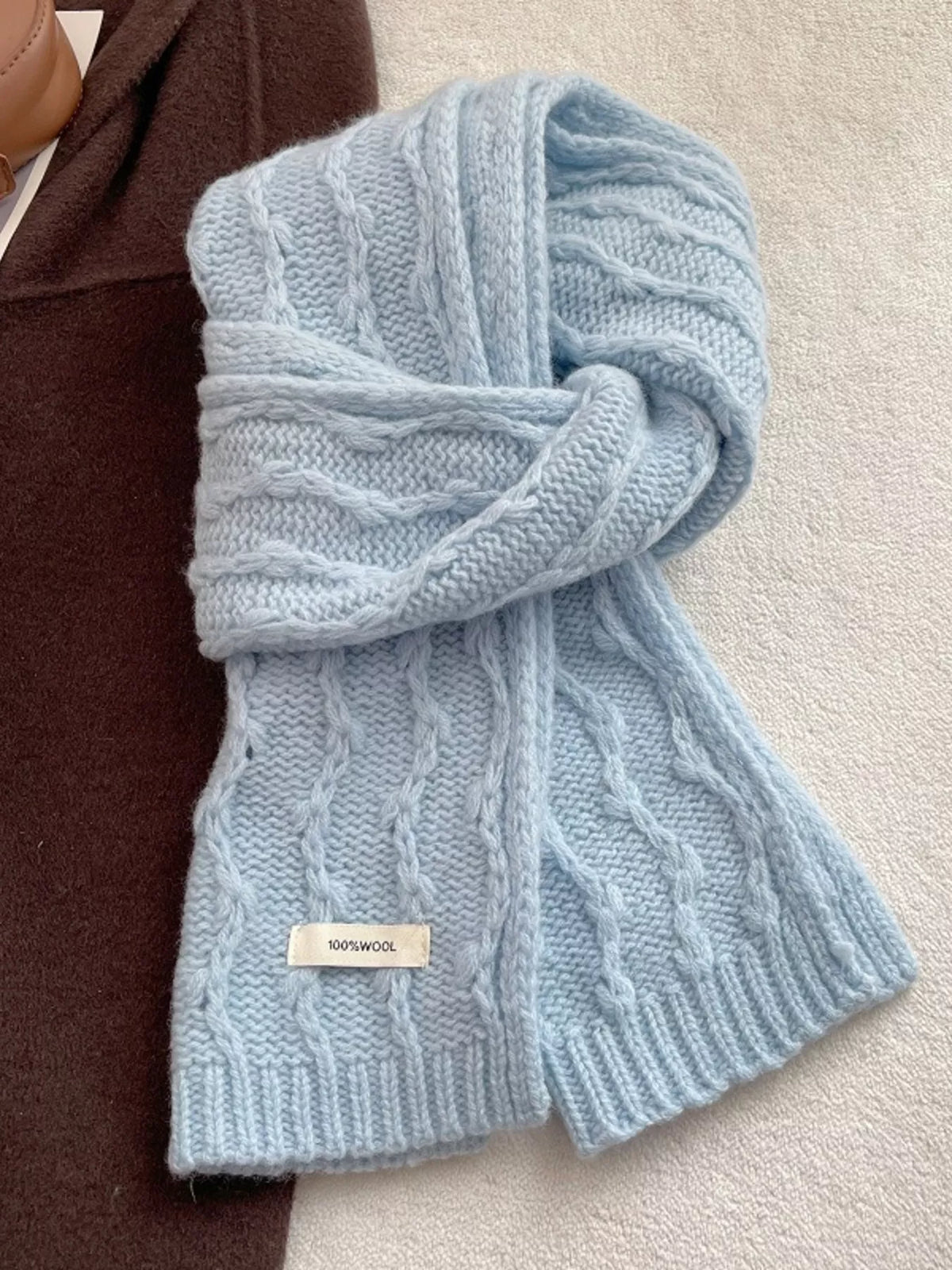 Unisex Wool Cozy Cable Knit Scarf — pale blue scarf tied with both ribbed ends visible