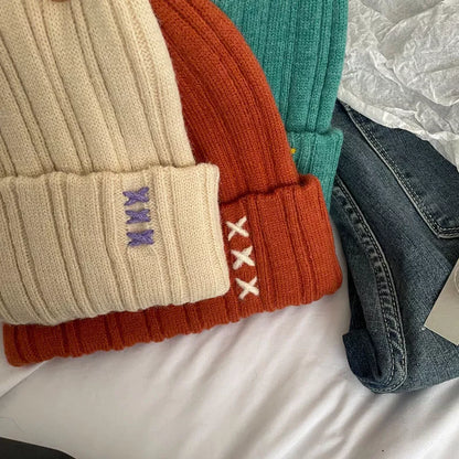 One size embroidered winter beanie studio angle