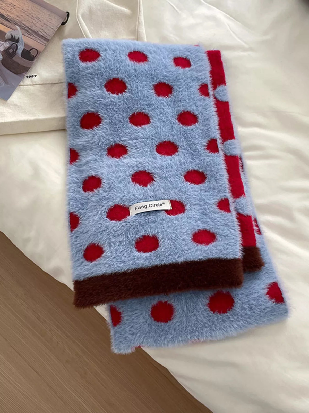 Unisex Blue Polka Dot Scarf — folded blue dotted scarf showing red contrast section
