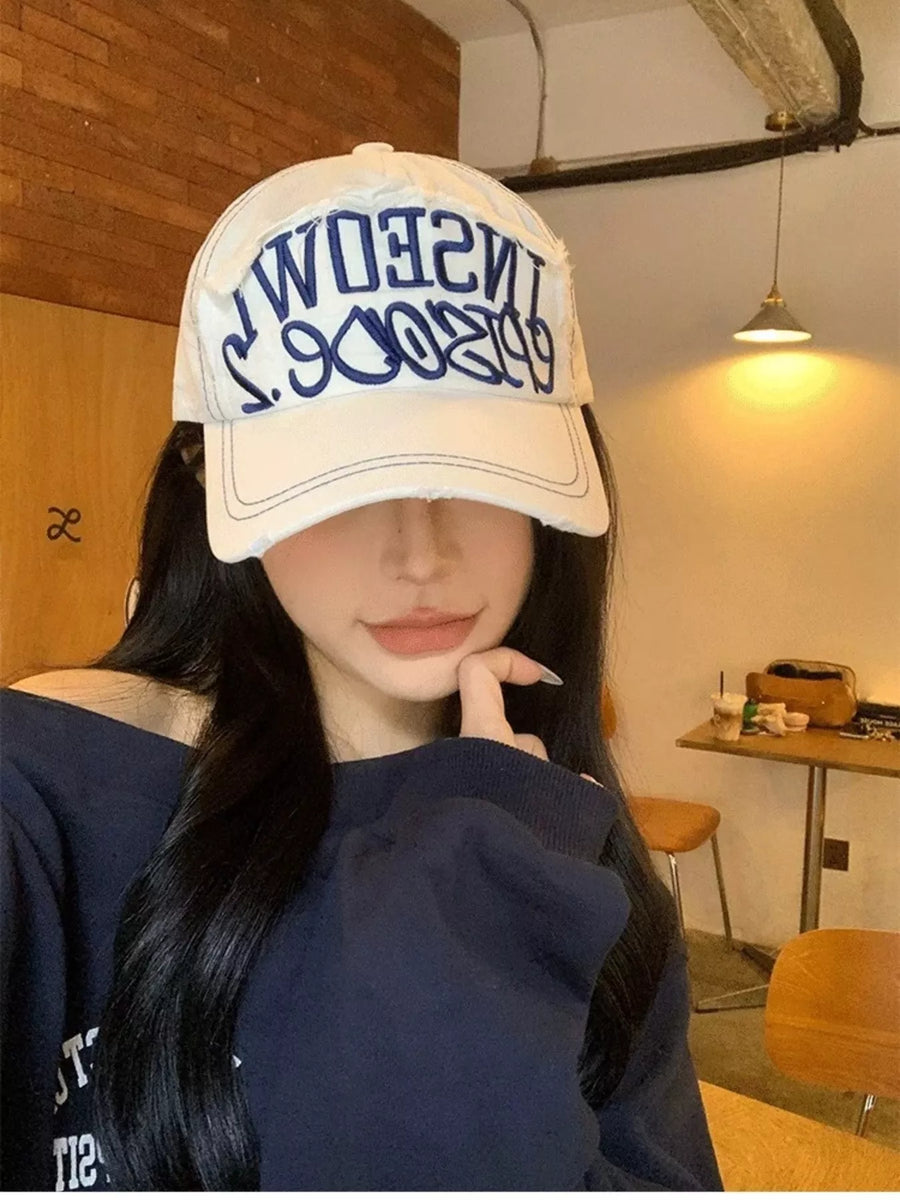 Gorra de béisbol bordada con letras