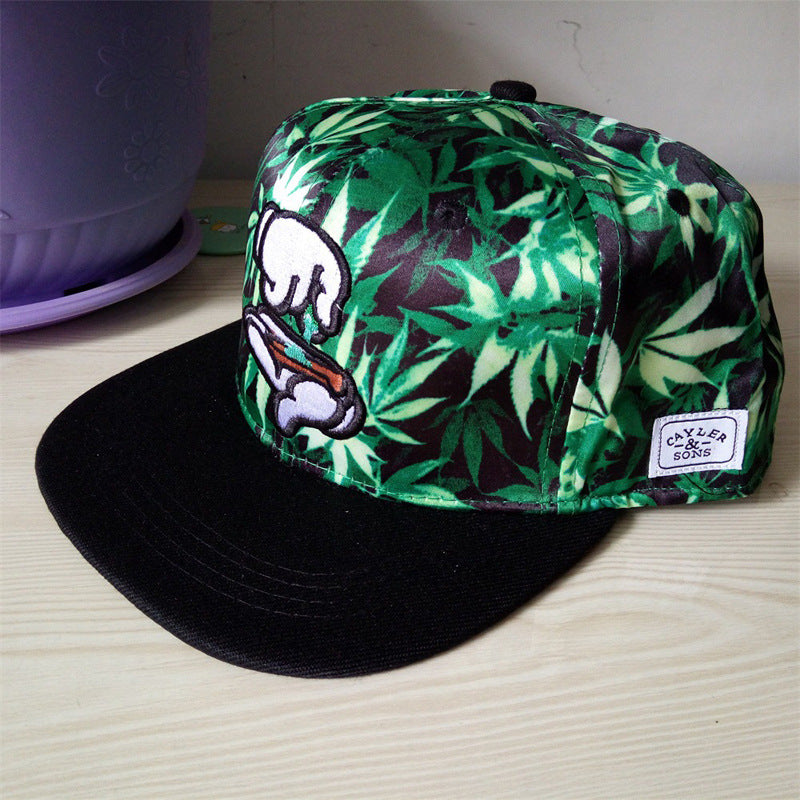 Unisex leaf print snapback cap in black and green front view