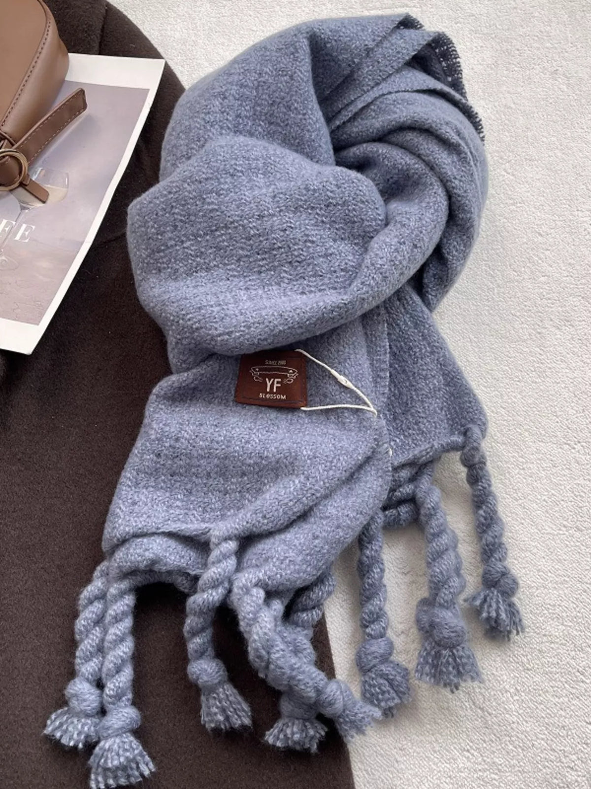 Unisex Knitted Tassel Scarf — blue scarf arranged to show long twisted tassels