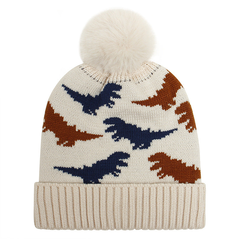 Beige kids jacquard beanie with brown and navy dinosaurs