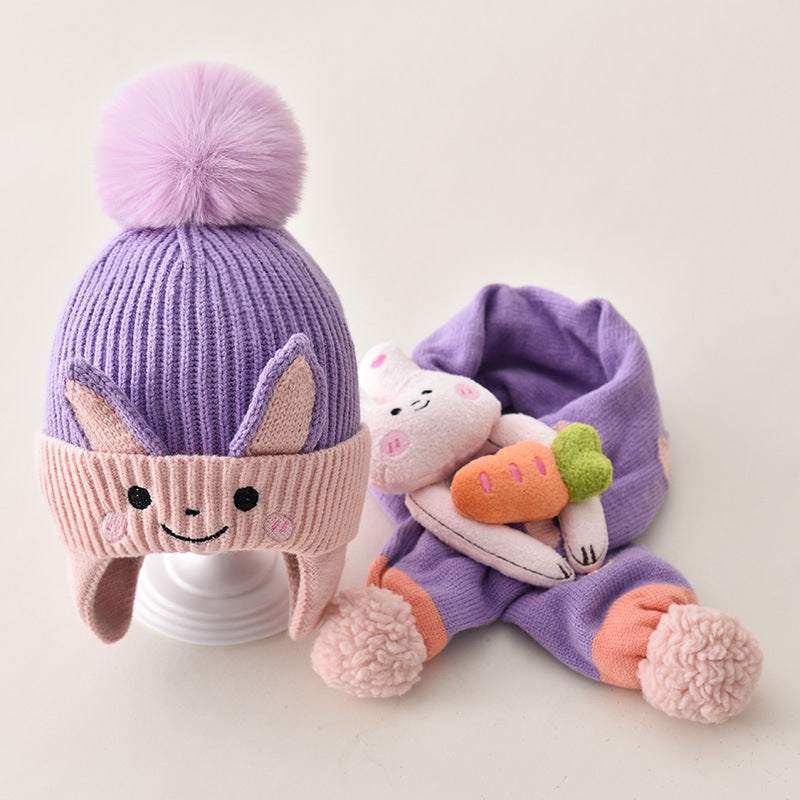Purple bunny-style pom pom beanie with matching scarf