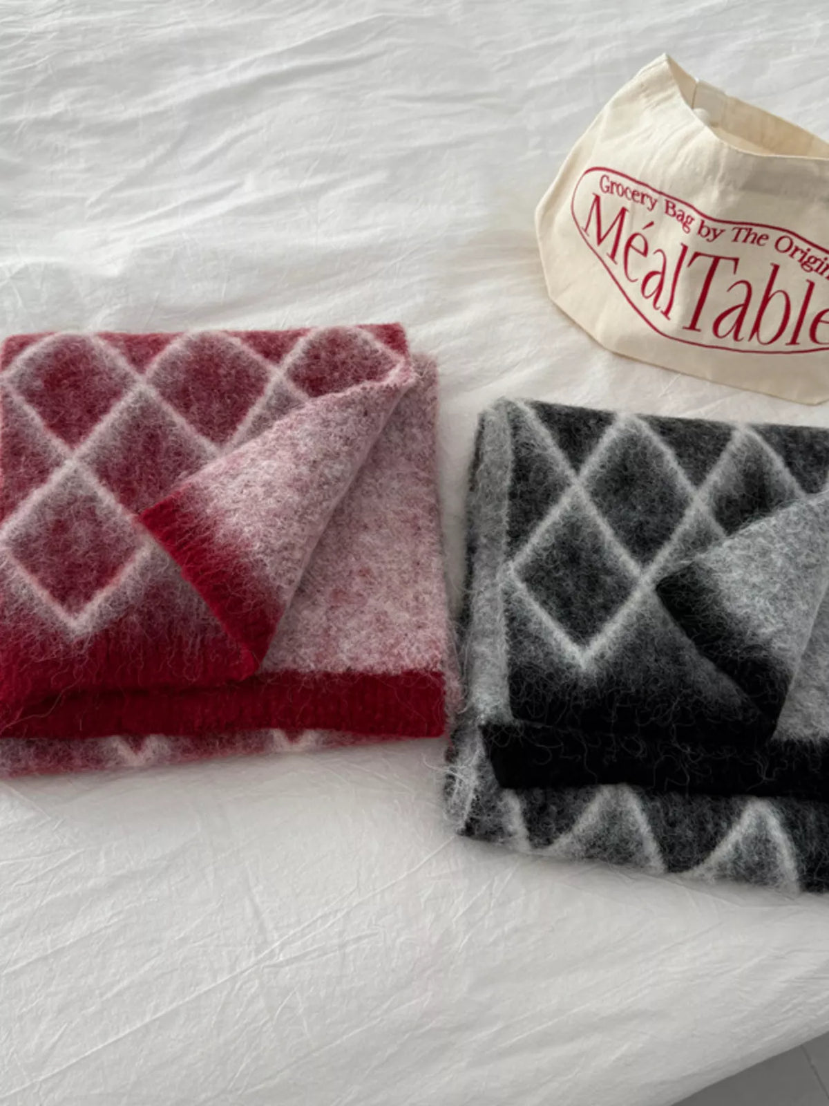Unisex Diamond Grid Fuzzy Scarf — folded red and dark scarves with crossing line pattern