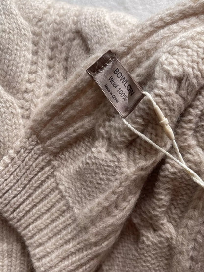 Unisex Wool Cable Knit Winter Scarf — close detail of beige wool knit and ribbed end border