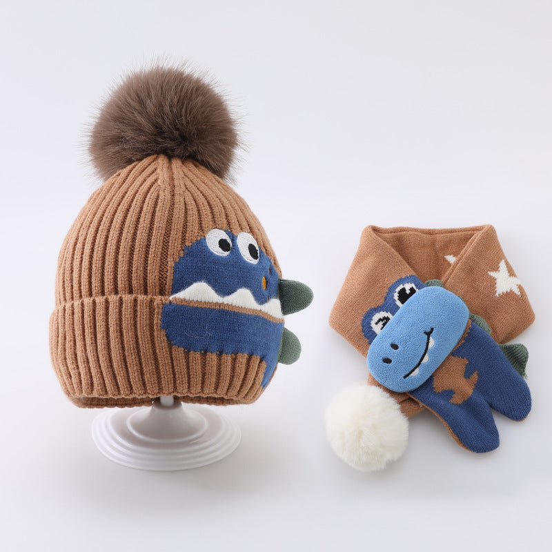 Khaki dinosaur beanie with brown pom pom and coordinating scarf