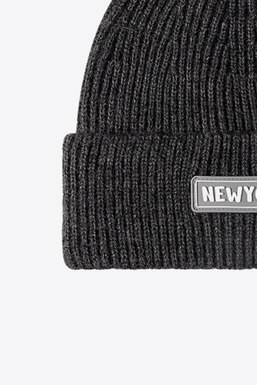 Orange NEWYORK patch cuffed beanie studio angle