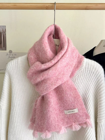 Unisex Tassel Knitted Scarf — pink wool scarf crossed over a pale sweater