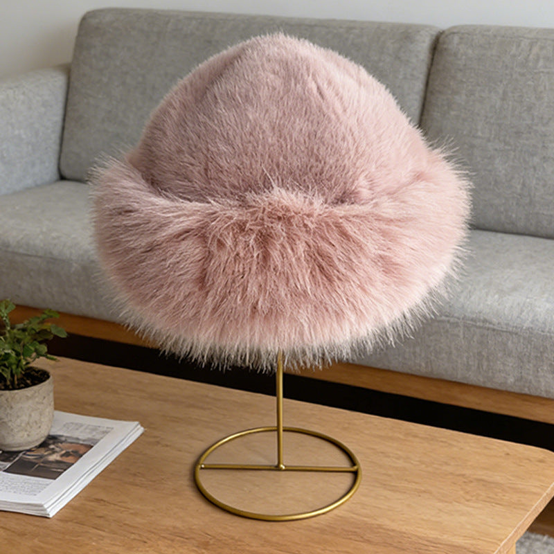 Light pink faux fur hat with a softly rounded crown