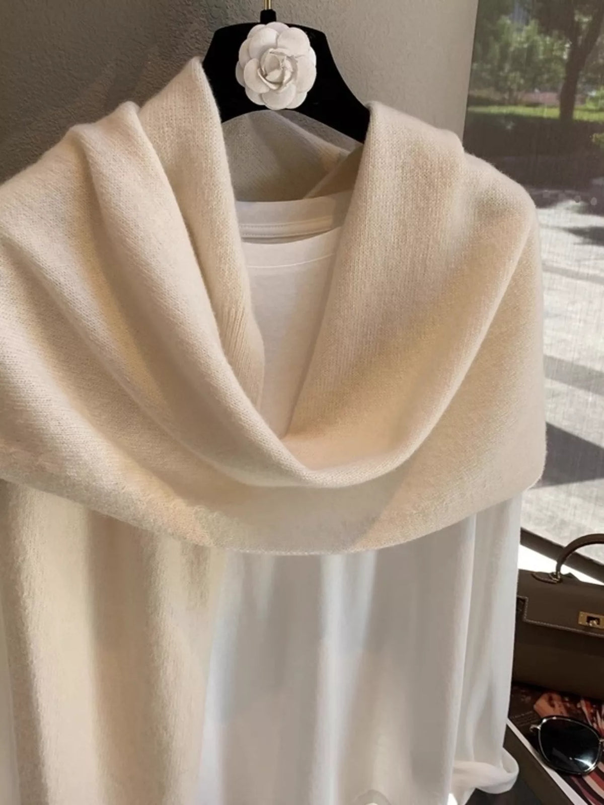 Women's Wool Knitted Asymmetrical Shawl — pale wool shawl draped with an open neckline