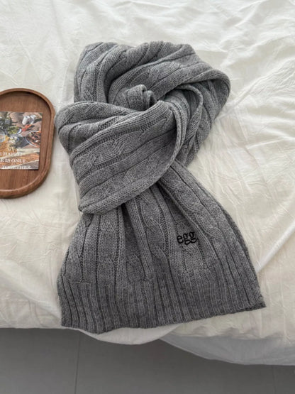 Unisex Cable Rib Winter Scarf — gray scarf showing raised knit columns
