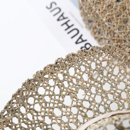 Elegant open-weave sun hat styled for summer