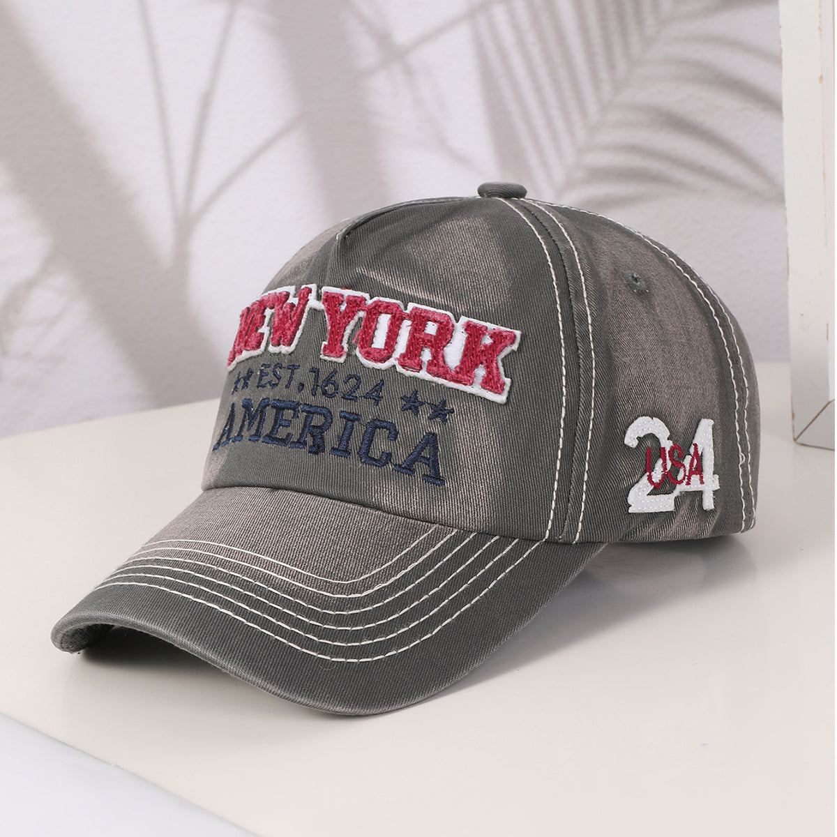 New York embroidery crown close-up