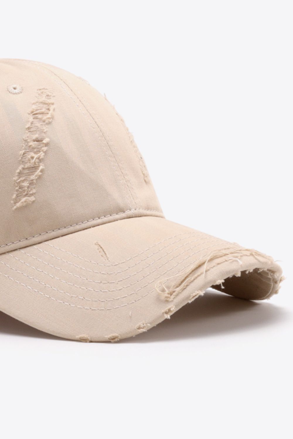 Washed cotton cap texture and brim detail