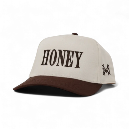 The Mad Hatter Company Honey Snapback, natural crown with a brown bill and dark lettering