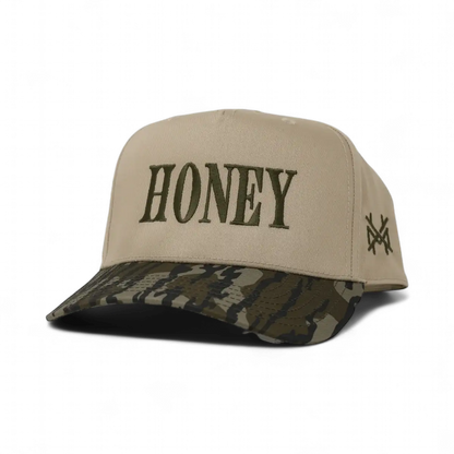 The Mad Hatter Company Honey Snapback, natural crown with a green camouflage bill