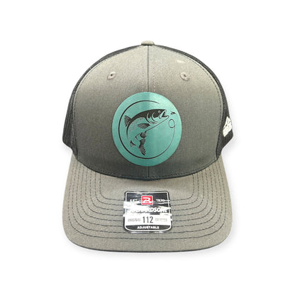 Front view of Fly Fish patch hat by Horizon Hat Co. in charcoal/black showing fish and fly-fishing rod patch artwork