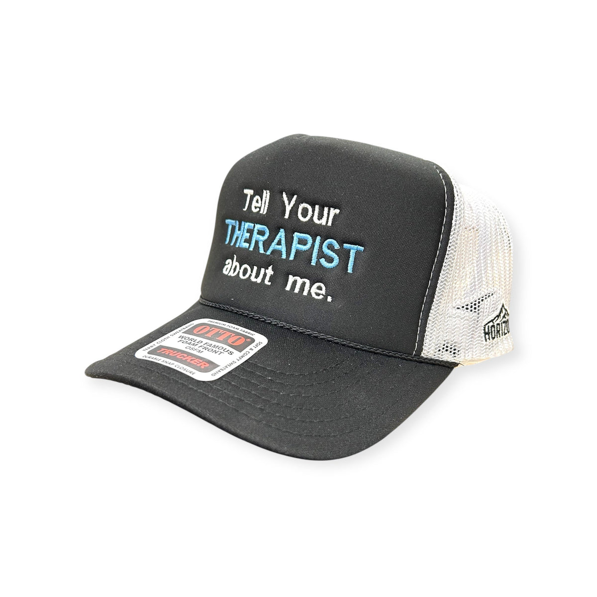 Angled view of Tell Your Therapist About Me embroidered cap by Horizon Hat Co. in black/white showing the bill and side panels