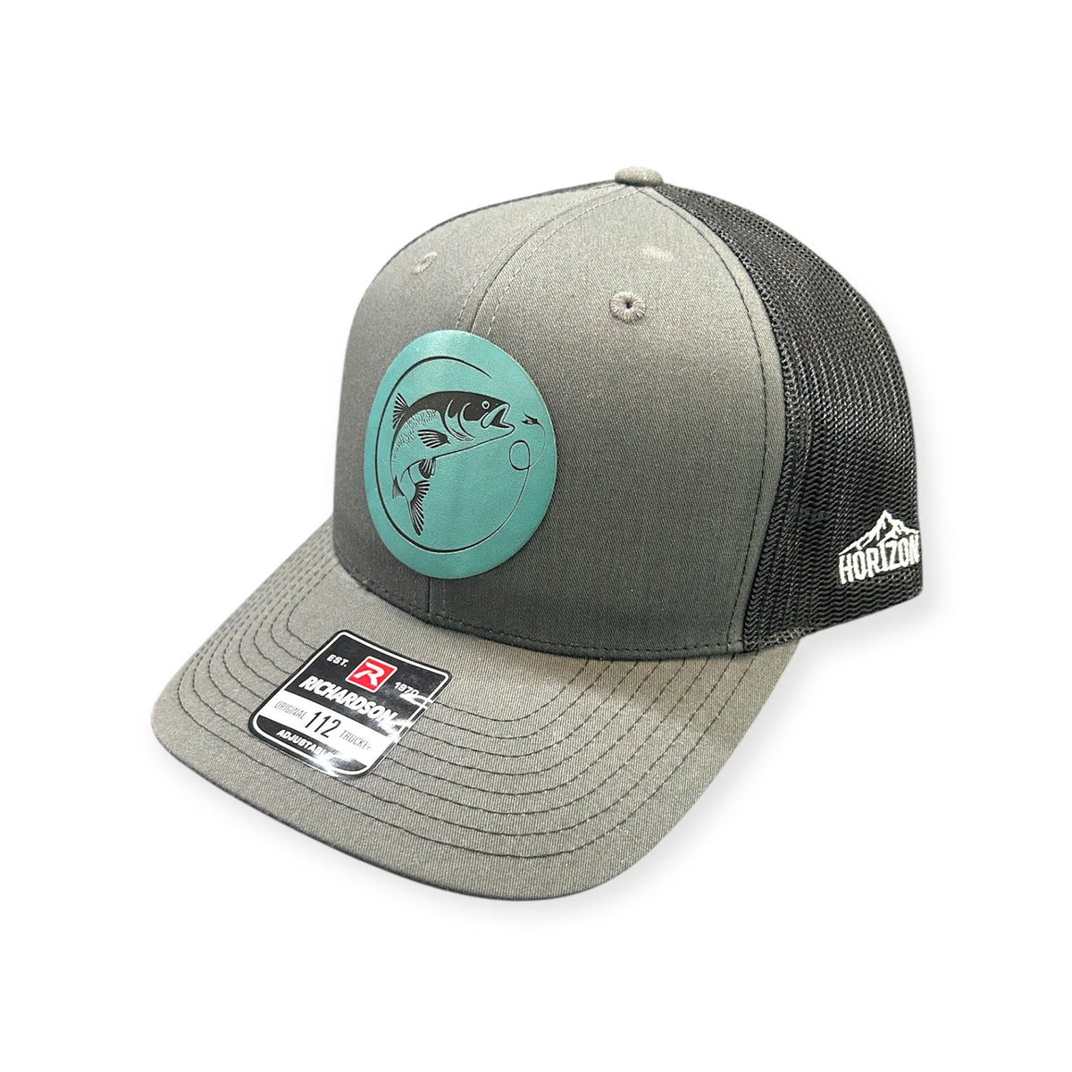 Angled view of Fly Fish patch hat by Horizon Hat Co. in charcoal/black showing the bill and side panels