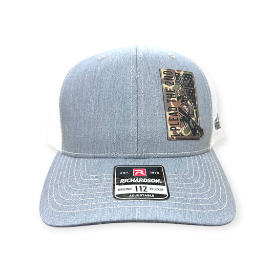 Front view of I Plead the 2nd patch hat by Horizon Hat Co. in heather gray/white showing statue of liberty holding a firearm on a patriotic statement patch