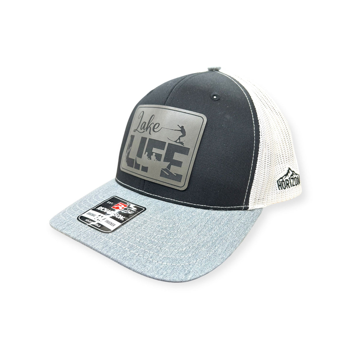 Angled view of Lake Life patch hat by Horizon Hat Co. in black/white/gray showing the curved bill and side panels