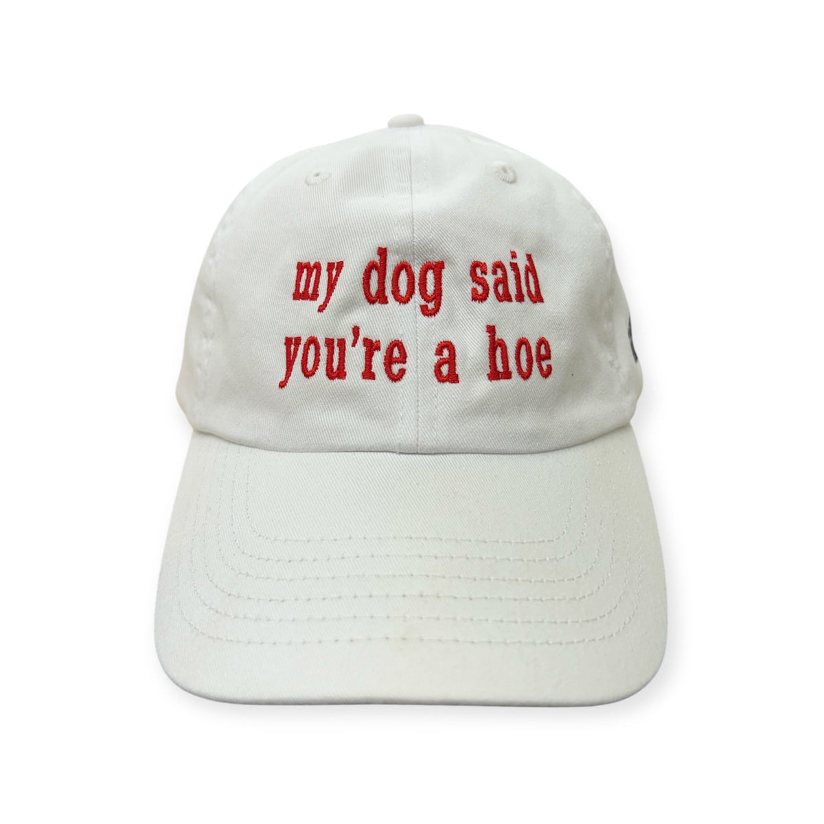 Front view of My Dog Said You're a Hoe embroidered cap by Horizon Hat Co. in white showing red my dog said you're a hoe front embroidery