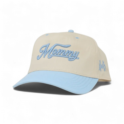 The Mad Hatter Company Mommy Snapback Hat, natural crown with a powder blue bill and blue lettering