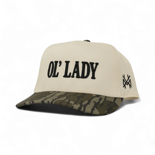 The Mad Hatter Company Ol Lady Snapback Hat, natural crown with a woodland camouflage bill and dark lettering